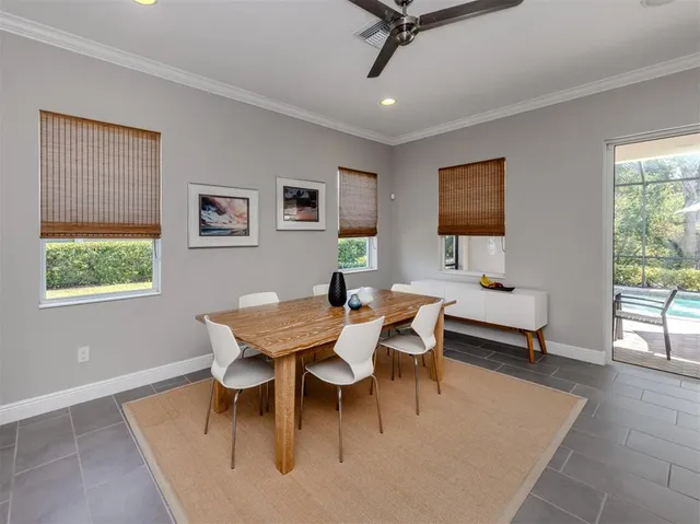a view of a dining room with furniture