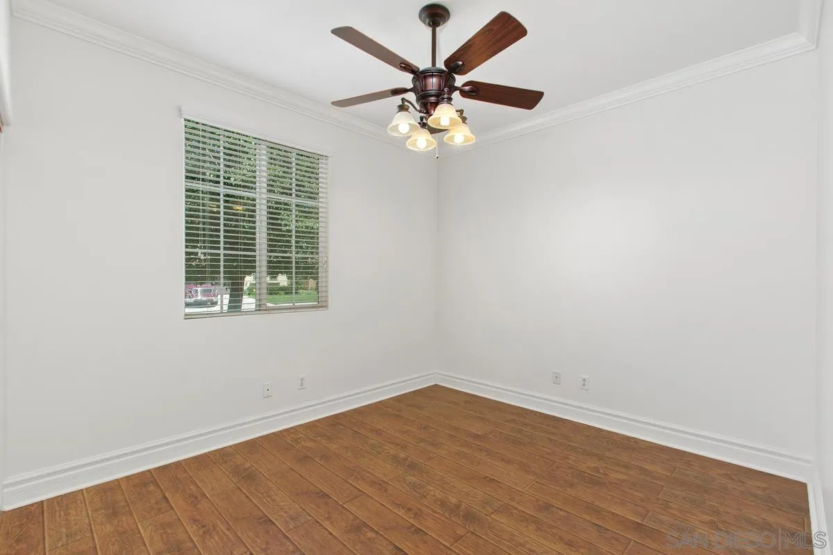1132 Tabernacle Lane San Jacinto, CA 92582 - Photo 24 of 39 an empty room with a window and a fan