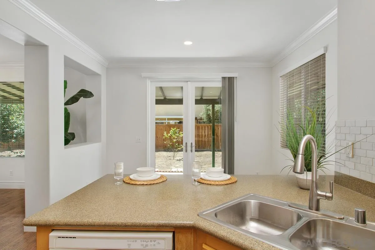 1132 Tabernacle Lane San Jacinto, CA 92582 - Photo 26 of 39 a kitchen with a sink and a window