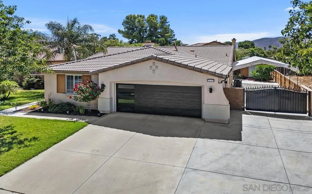 1132 Tabernacle Lane San Jacinto, CA 92582 - Photo 3 of 39 a front view of house with yard garage and outdoor seating