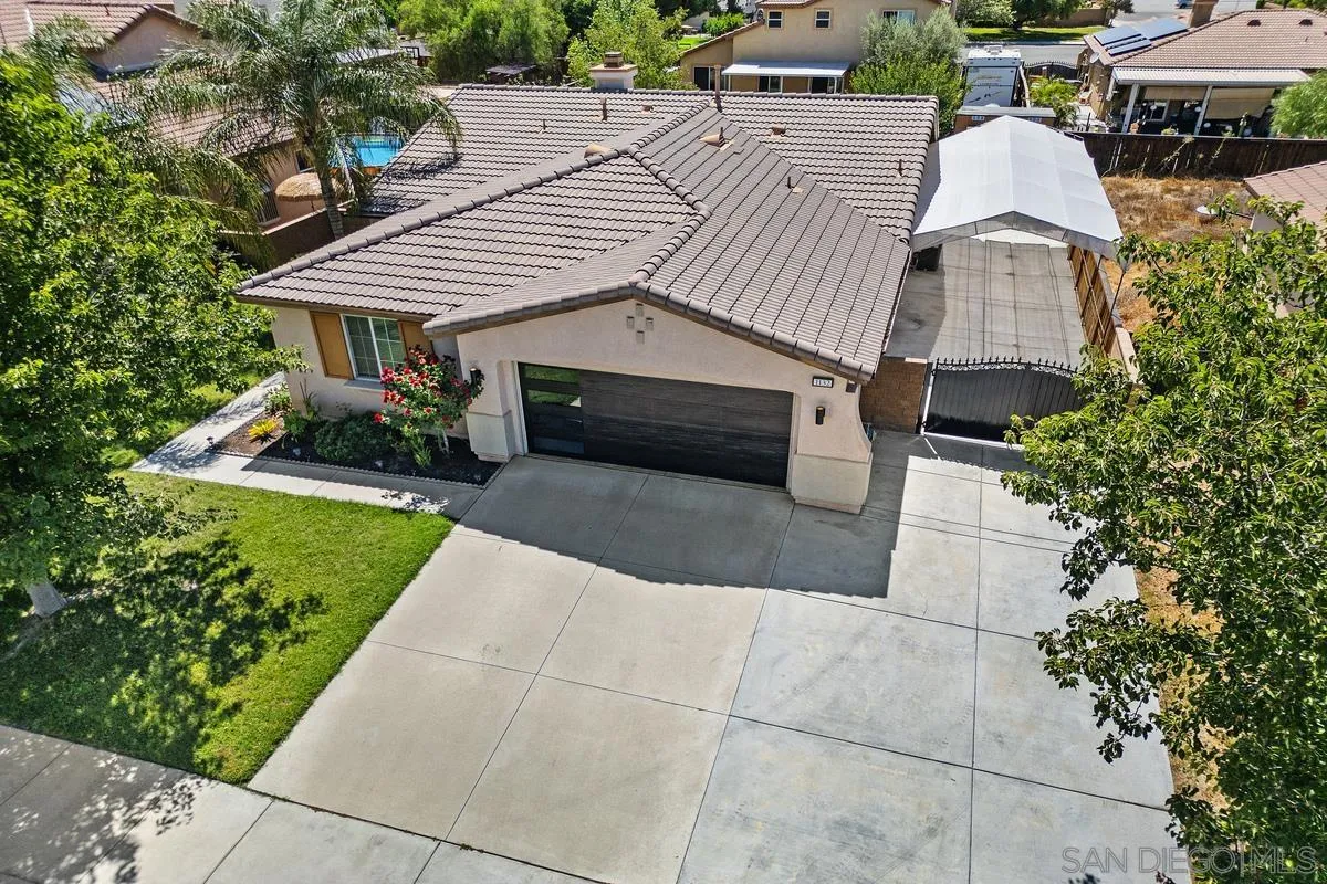 1132 Tabernacle Lane San Jacinto, CA 92582 - Photo 34 of 39 a aerial view of a house with yard and furniture
