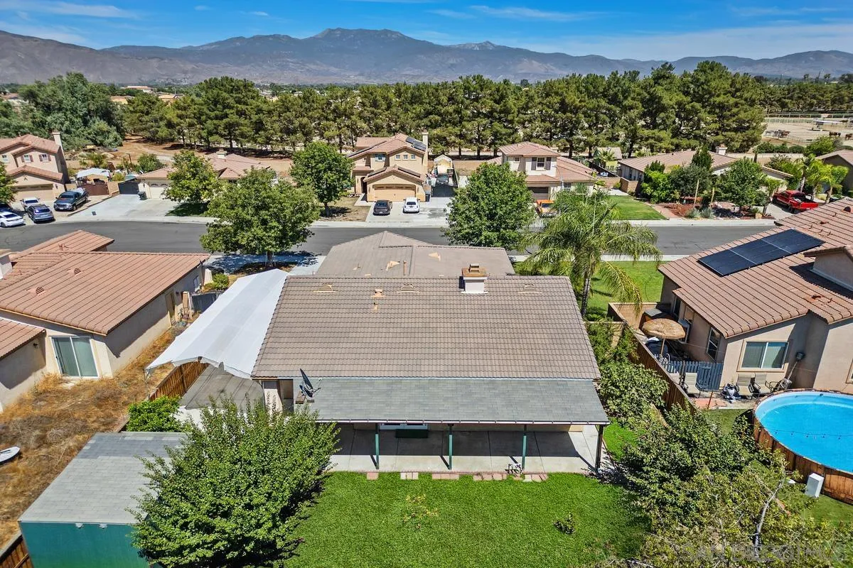 1132 Tabernacle Lane San Jacinto, CA 92582 - Photo 35 of 39 an aerial view of a house with a yard and lake view