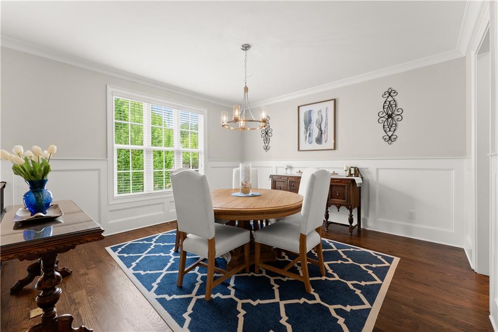 3206 Ridge Towne Place Duluth, GA 30096 - Photo 5 of 42 a view of a dining room with furniture window and wooden floor