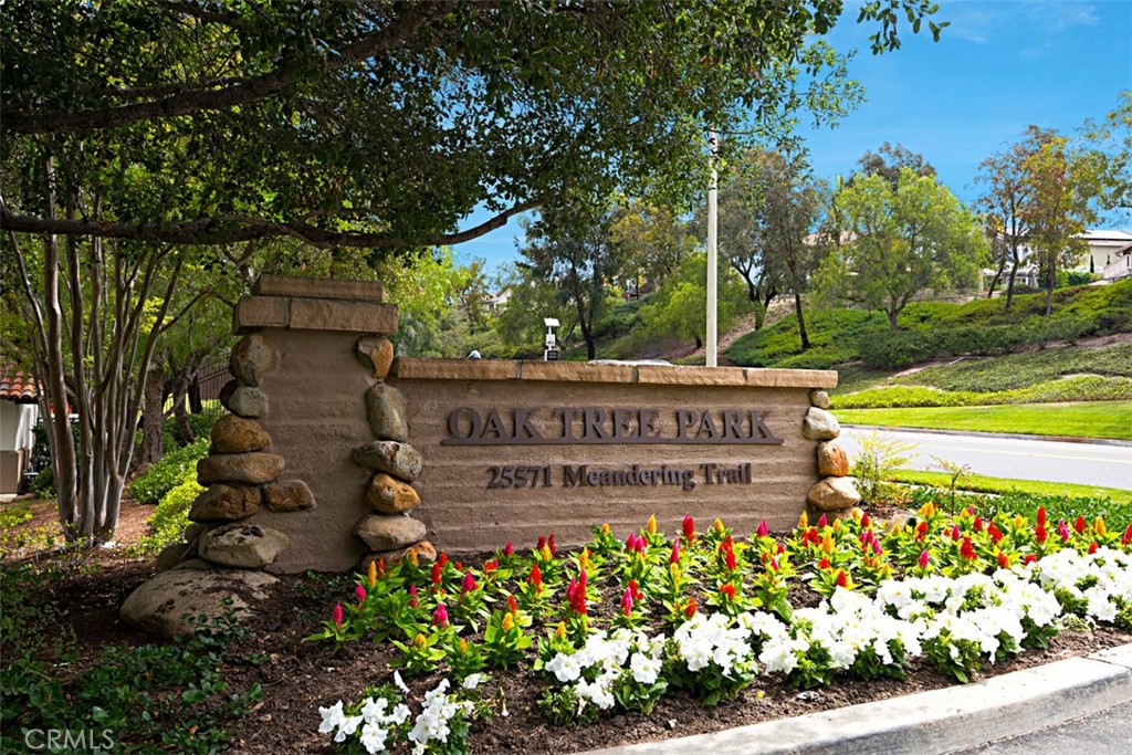56 Acorn Ridge Rancho Santa Margarita, CA 92688 - Photo 50 of 57 Oaktree Park Entrance: Landscaped monument sign marks the entrance to Oaktree Park along Meandering Trail.