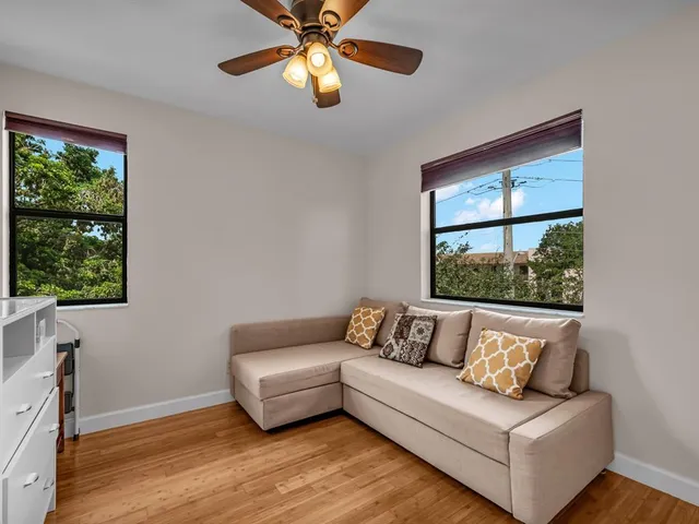 a living room with furniture and a window