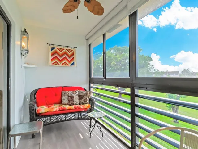 a bench sitting in front of a building