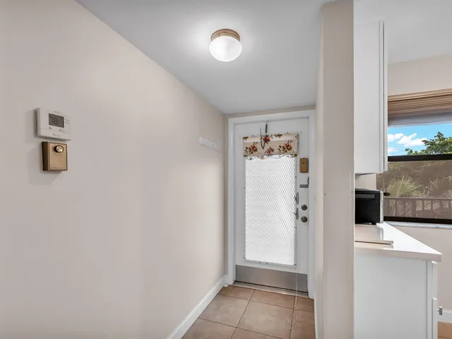 a view of a hallway with elevator