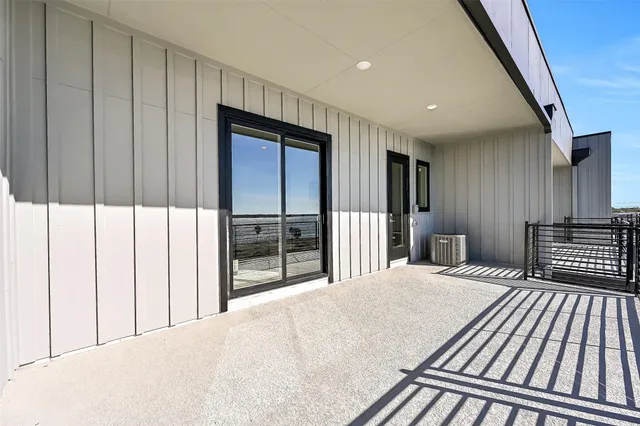 a bedroom with a bed and a view of closet