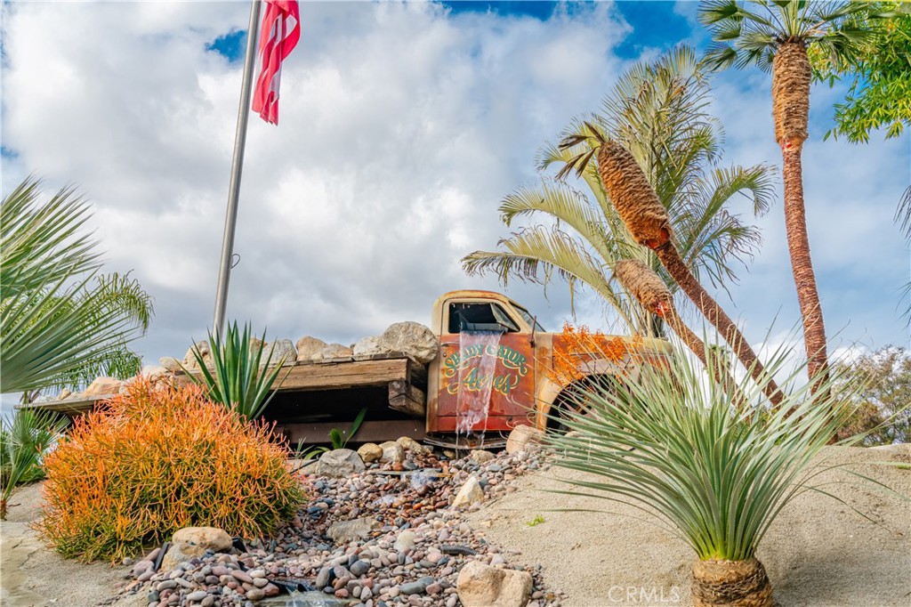 20950 Claire Road Perris, CA 92570 - Photo 18 of 74 a front view of a house with a garden