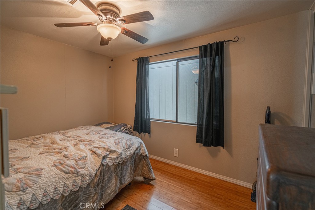 20950 Claire Road Perris, CA 92570 - Photo 39 of 74 a bedroom with a bed and a window