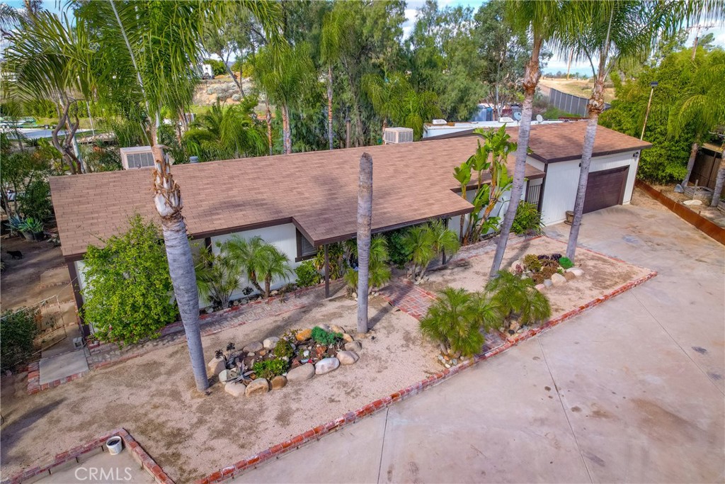 20950 Claire Road Perris, CA 92570 - Photo 4 of 74 a view of a backyard with sitting area
