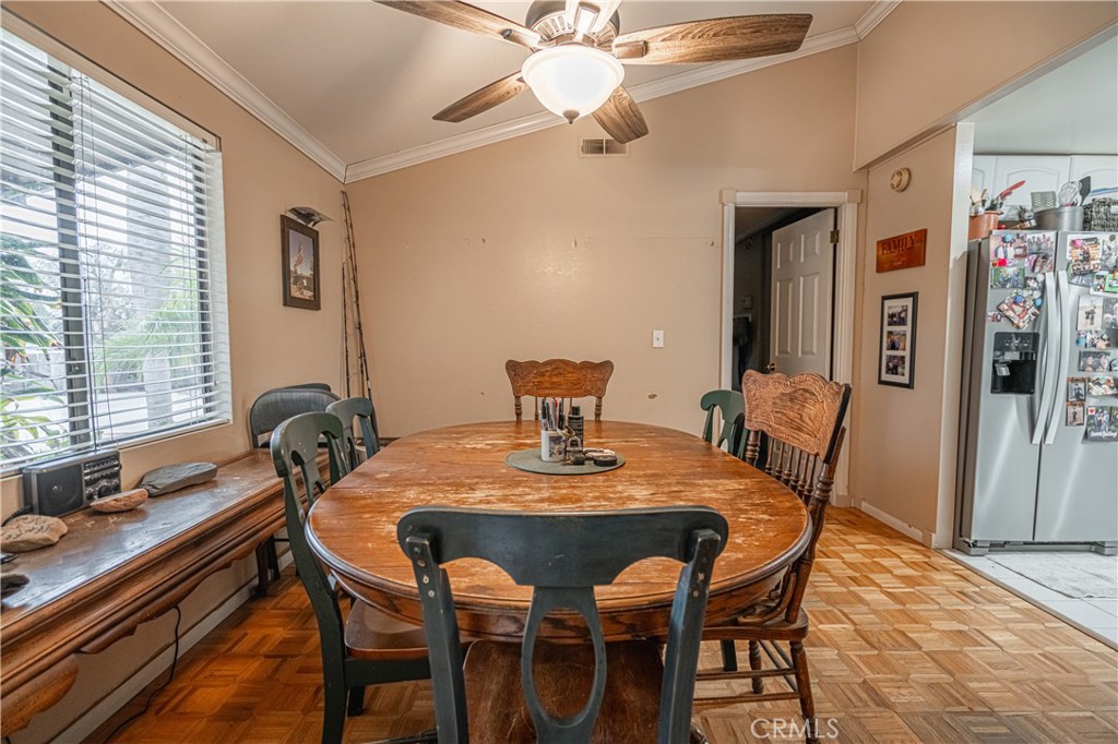 20950 Claire Road Perris, CA 92570 - Photo 46 of 74 a view of a dining room with furniture and window