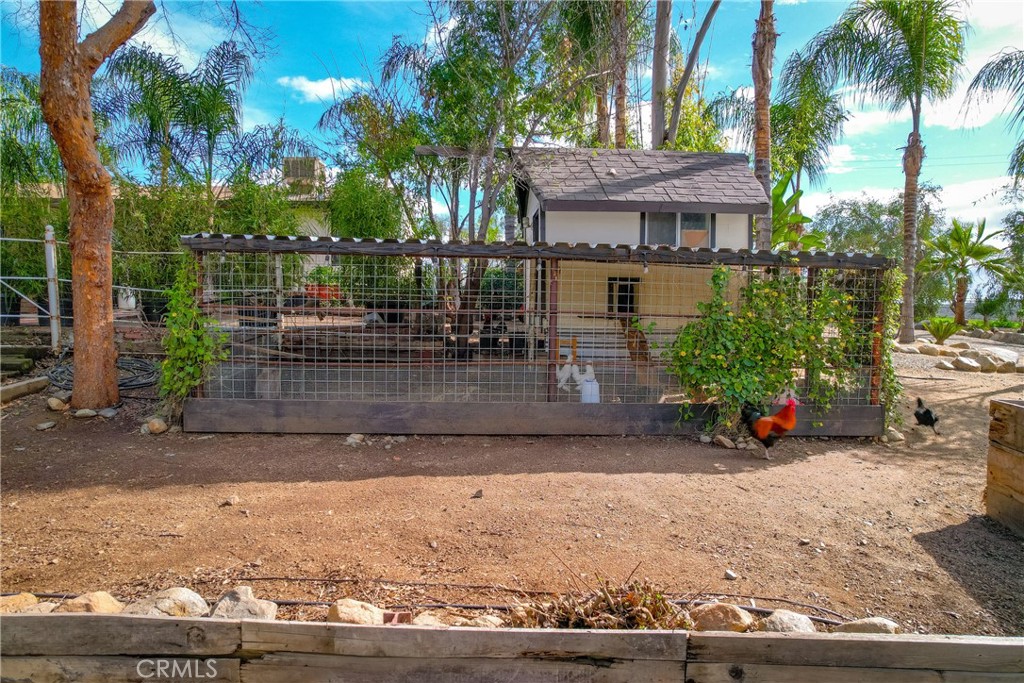 20950 Claire Road Perris, CA 92570 - Photo 61 of 74 a view of a house with a patio