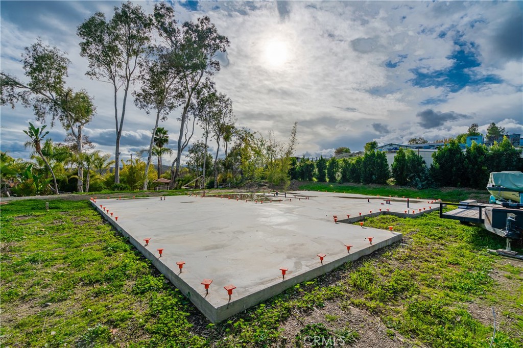 20950 Claire Road Perris, CA 92570 - Photo 70 of 74 a view of a swimming pool outdoor space and sitting area