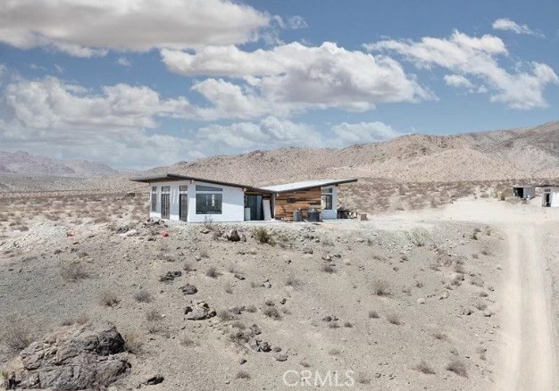 20950 Claire Road Perris, CA 92570 - Photo 72 of 74 a view of a dry yard with wooden fence