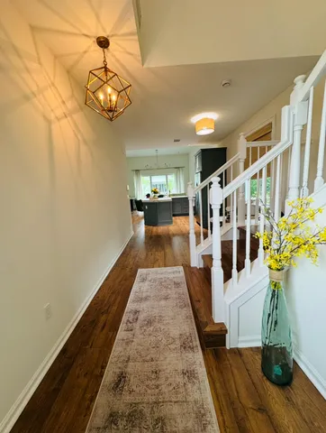 a view of a living room with a dining table