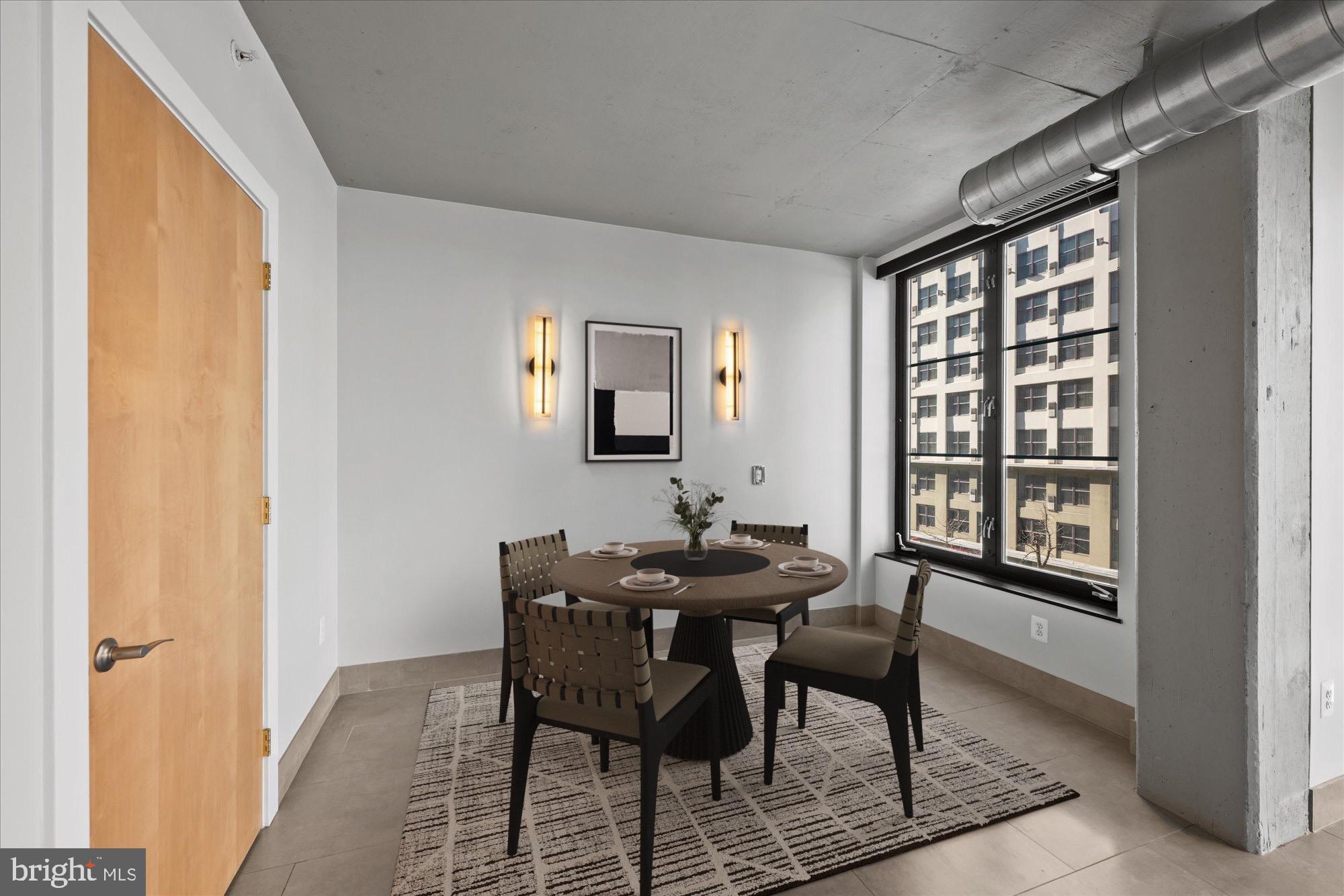 1133 14th Street Northwest, Unit 404 Washington, DC 20005 - Photo 8 of 15 a view of a dining room with furniture and window