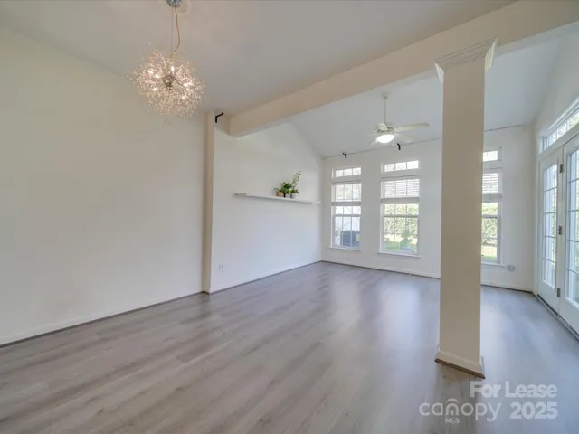 a view of livingroom with window and hardwood floor
