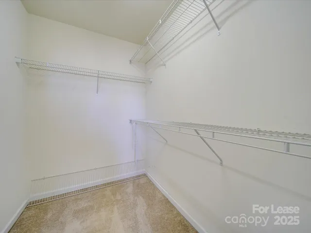 a view of a room with racks on the wall