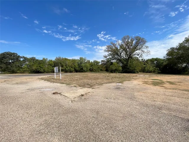 a view of a backyard of a house