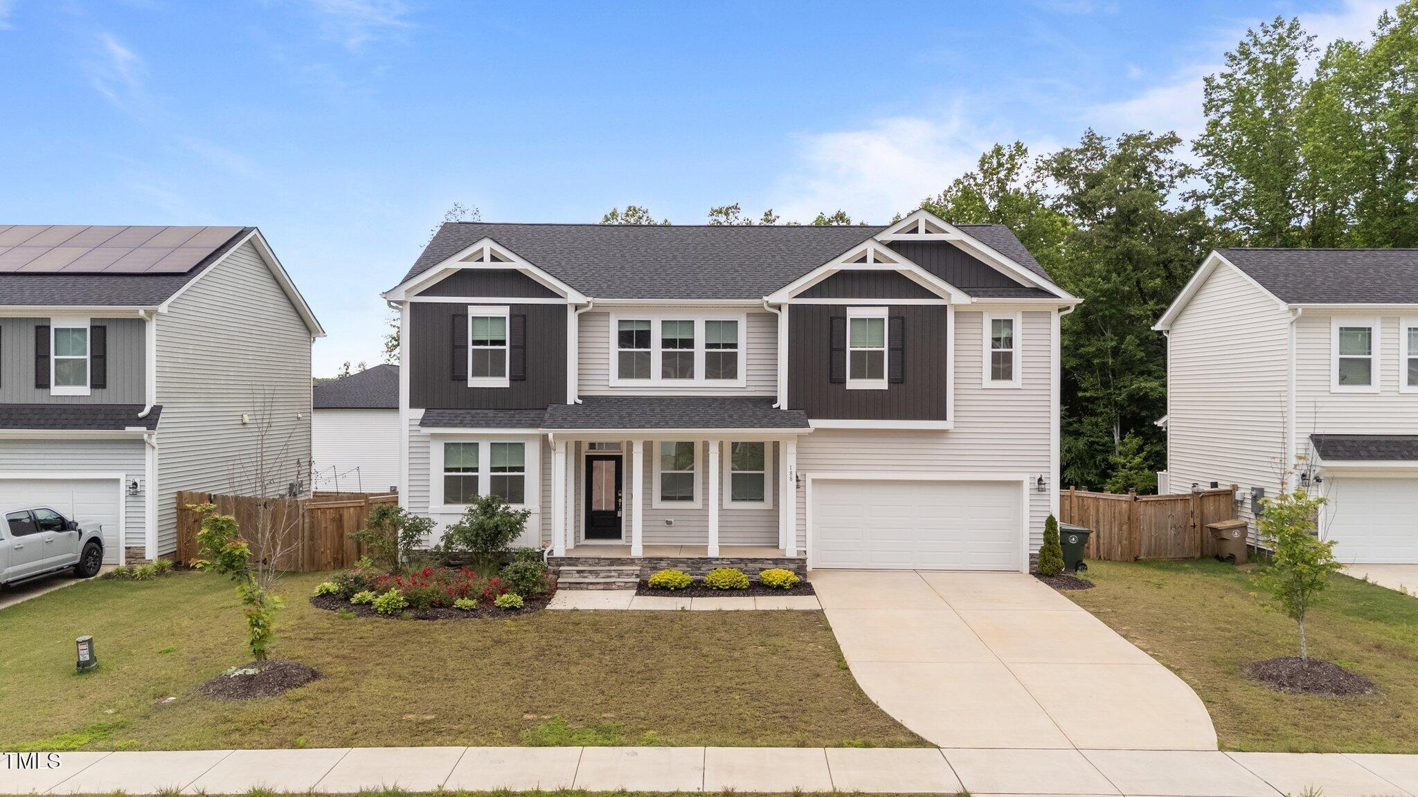 188 Karlov Road Garner, NC 27529 - Photo 1 of 38 a view of a house with a patio