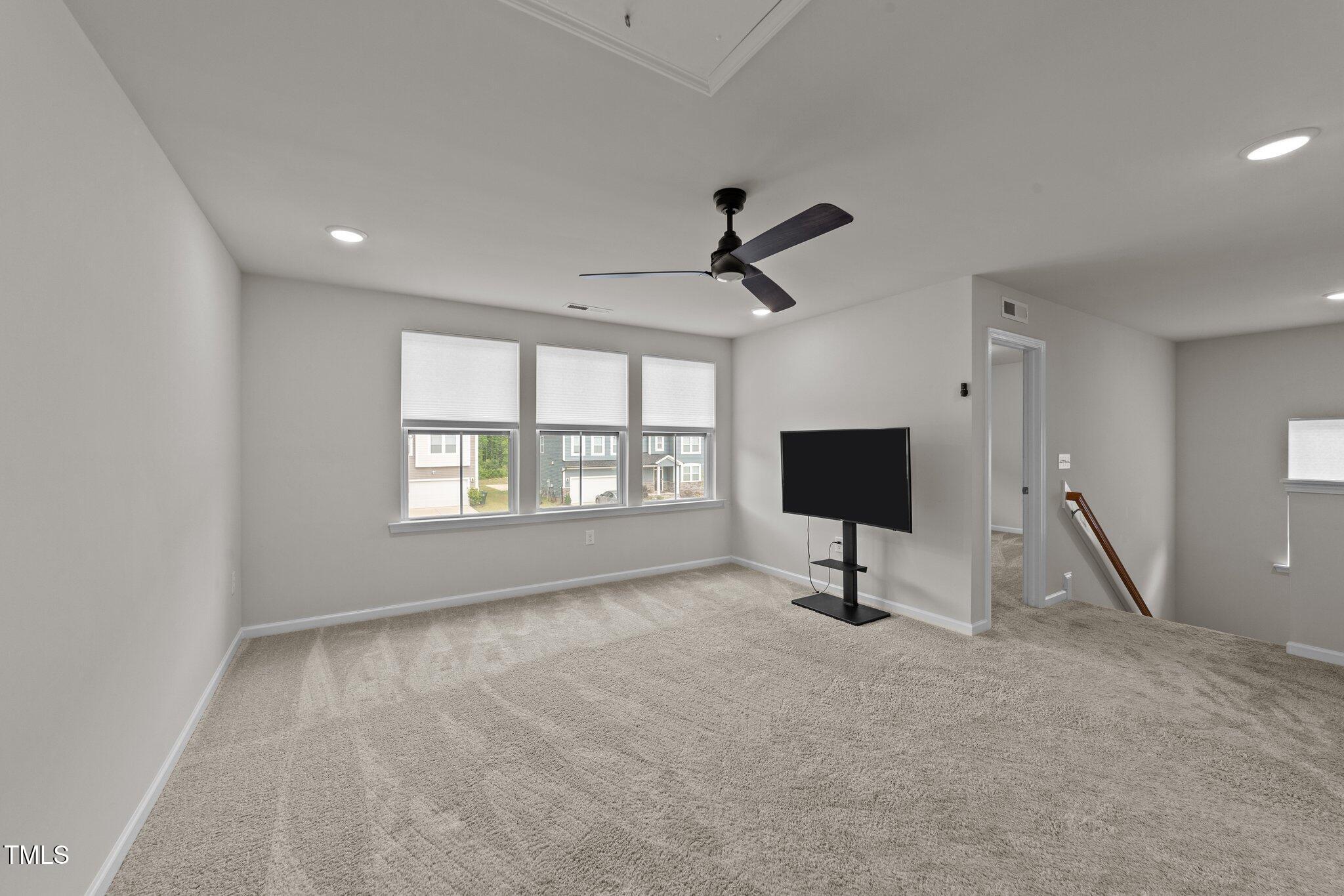 188 Karlov Road Garner, NC 27529 - Photo 18 of 38 a view of an empty room with a window