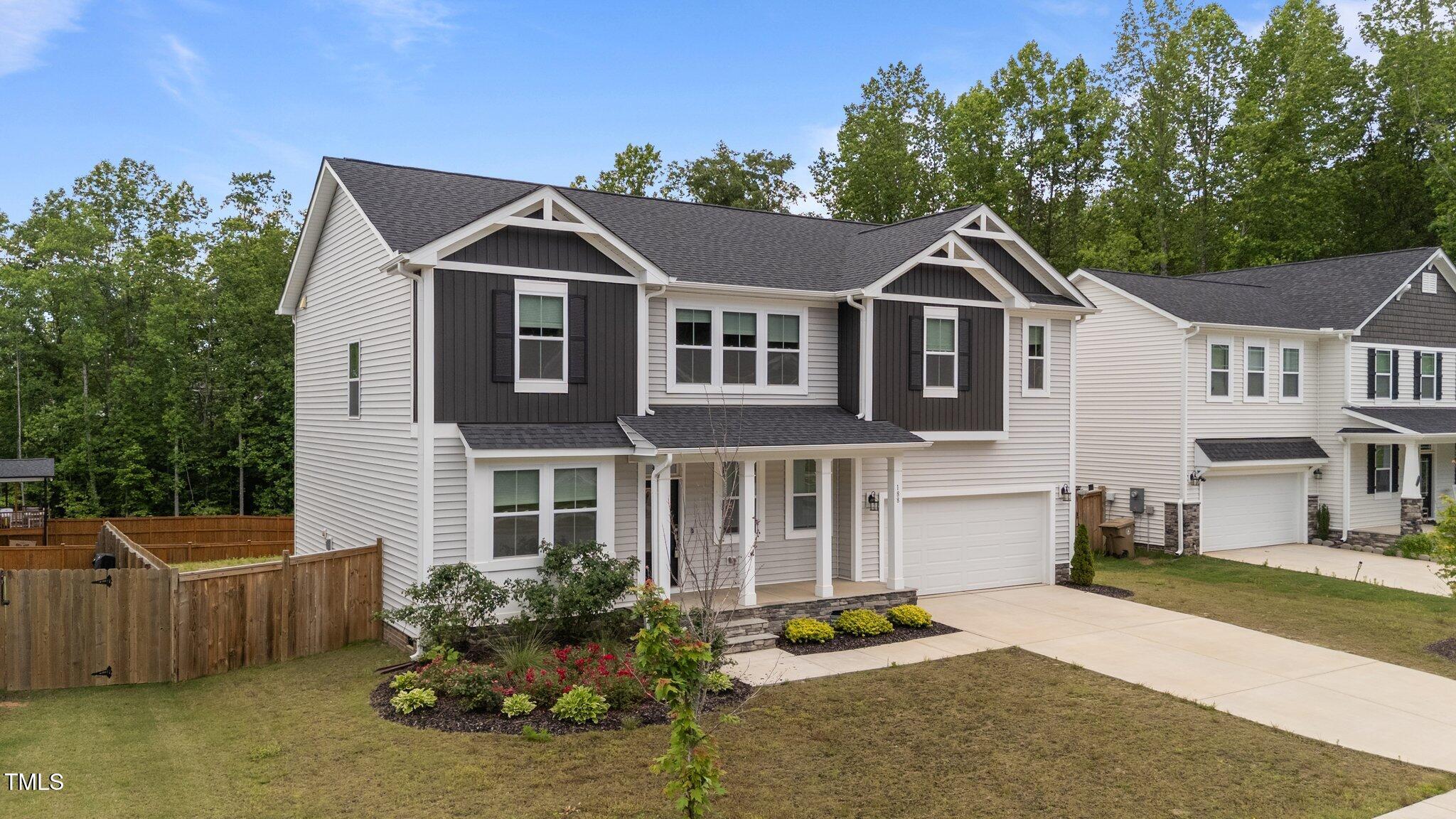 188 Karlov Road Garner, NC 27529 - Photo 2 of 38 a front view of a house with a yard