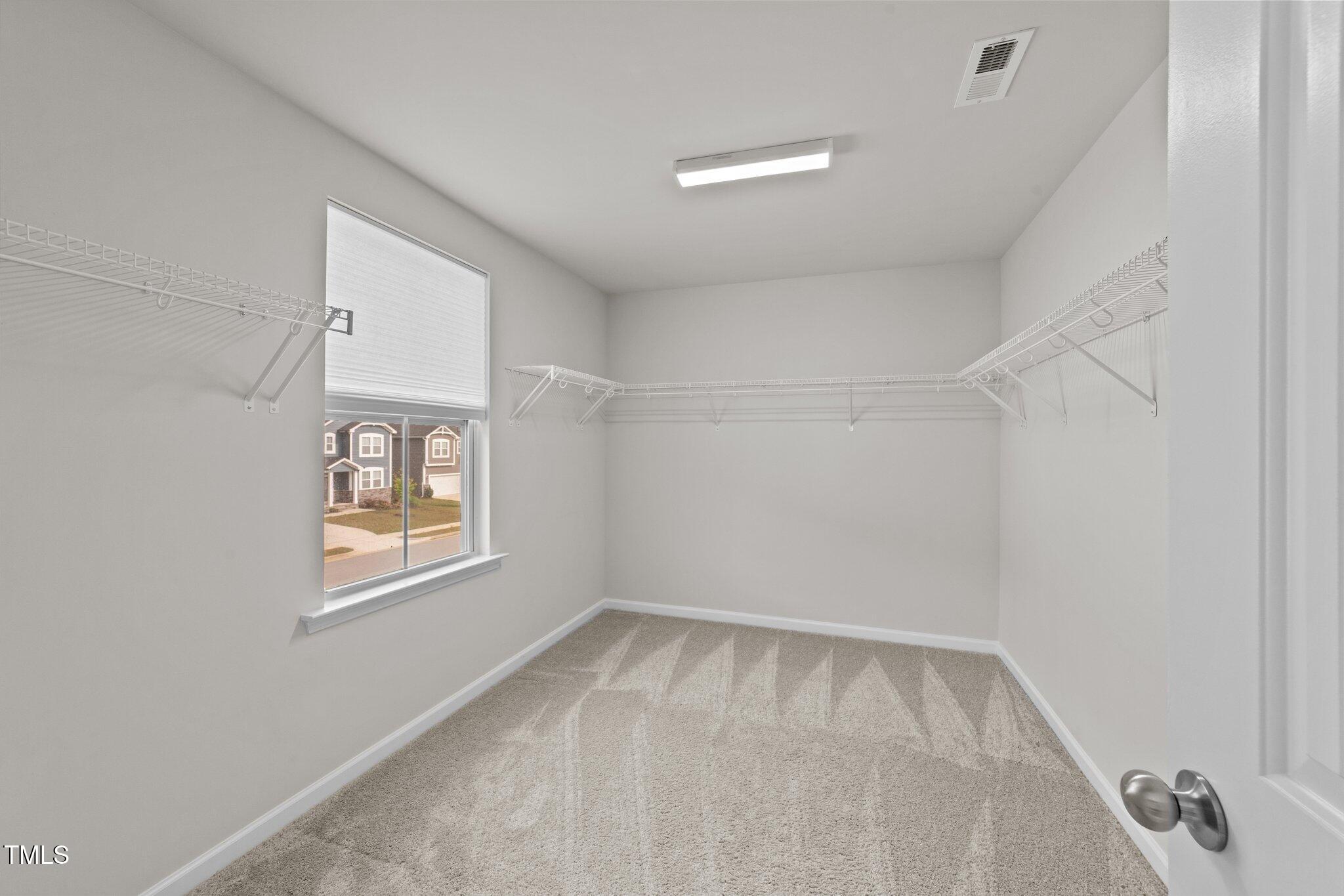 188 Karlov Road Garner, NC 27529 - Photo 24 of 38 an empty room with a window