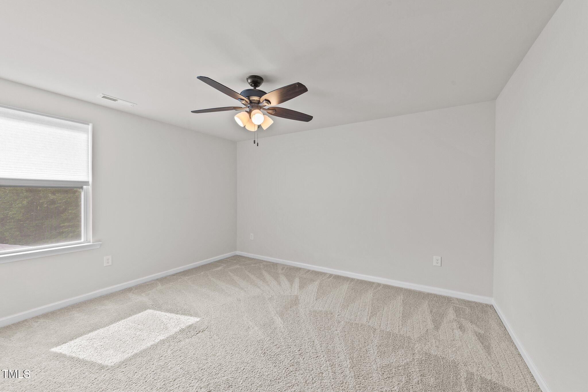 188 Karlov Road Garner, NC 27529 - Photo 25 of 38 an empty room with a window