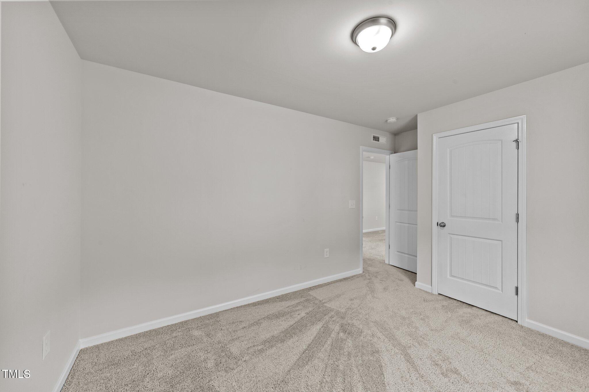 188 Karlov Road Garner, NC 27529 - Photo 31 of 38 a view of an empty room