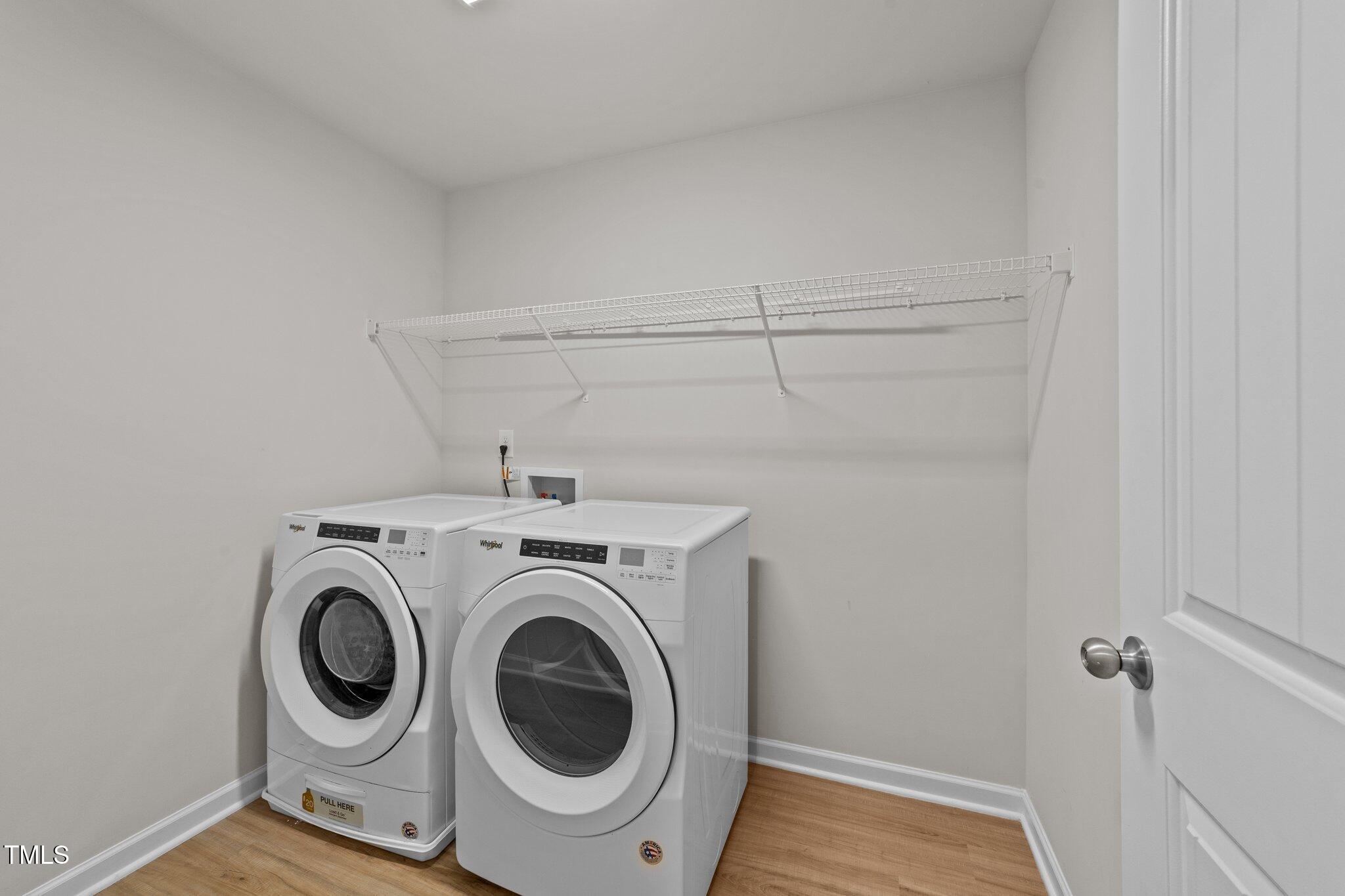 188 Karlov Road Garner, NC 27529 - Photo 32 of 38 a utility room with dryer and washer