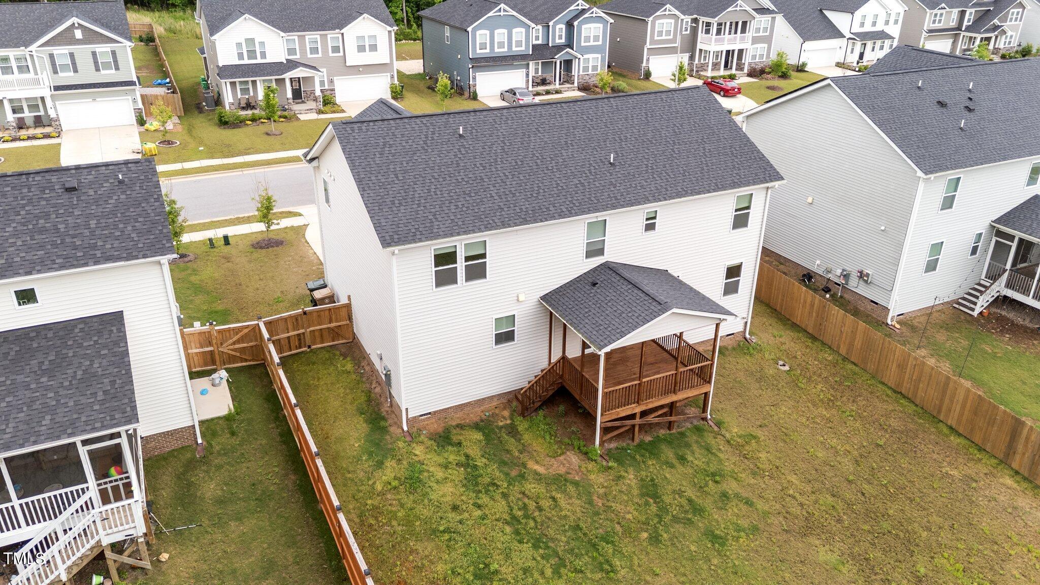188 Karlov Road Garner, NC 27529 - Photo 34 of 38 an aerial view of a house with a swimming pool