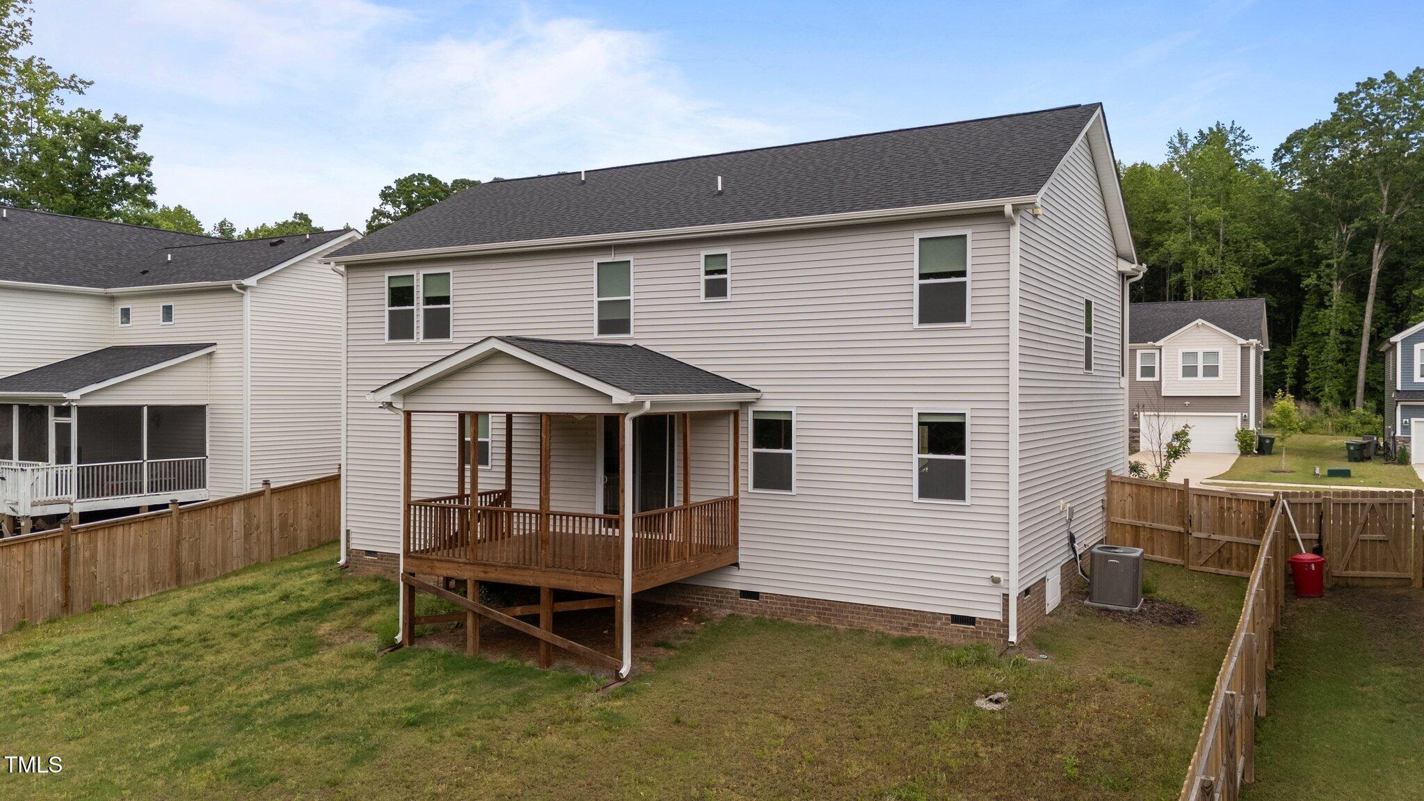 188 Karlov Road Garner, NC 27529 - Photo 36 of 38 a view of a house with a yard chairs and kitchen