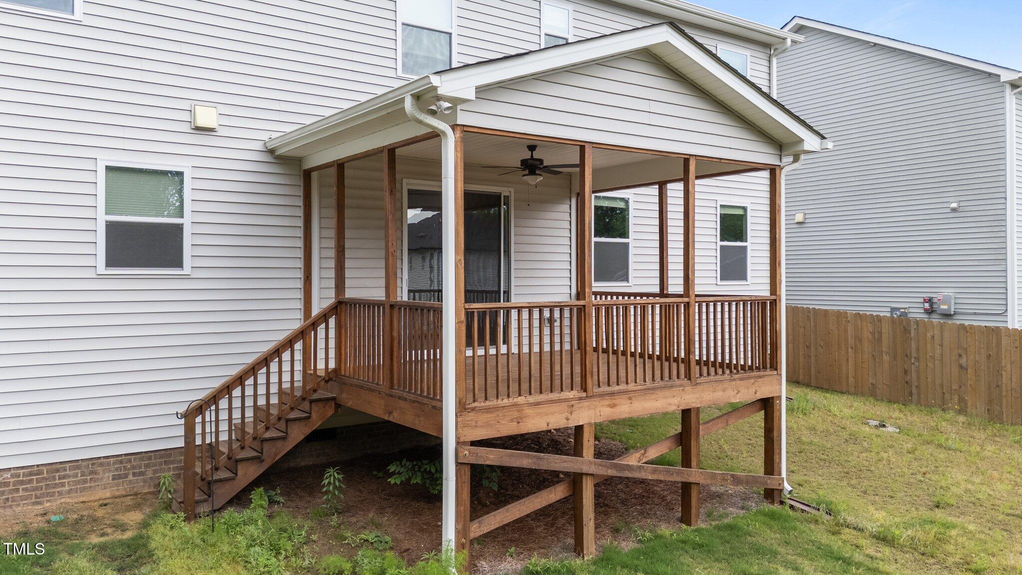 188 Karlov Road Garner, NC 27529 - Photo 37 of 38 a view of a house with wooden deck