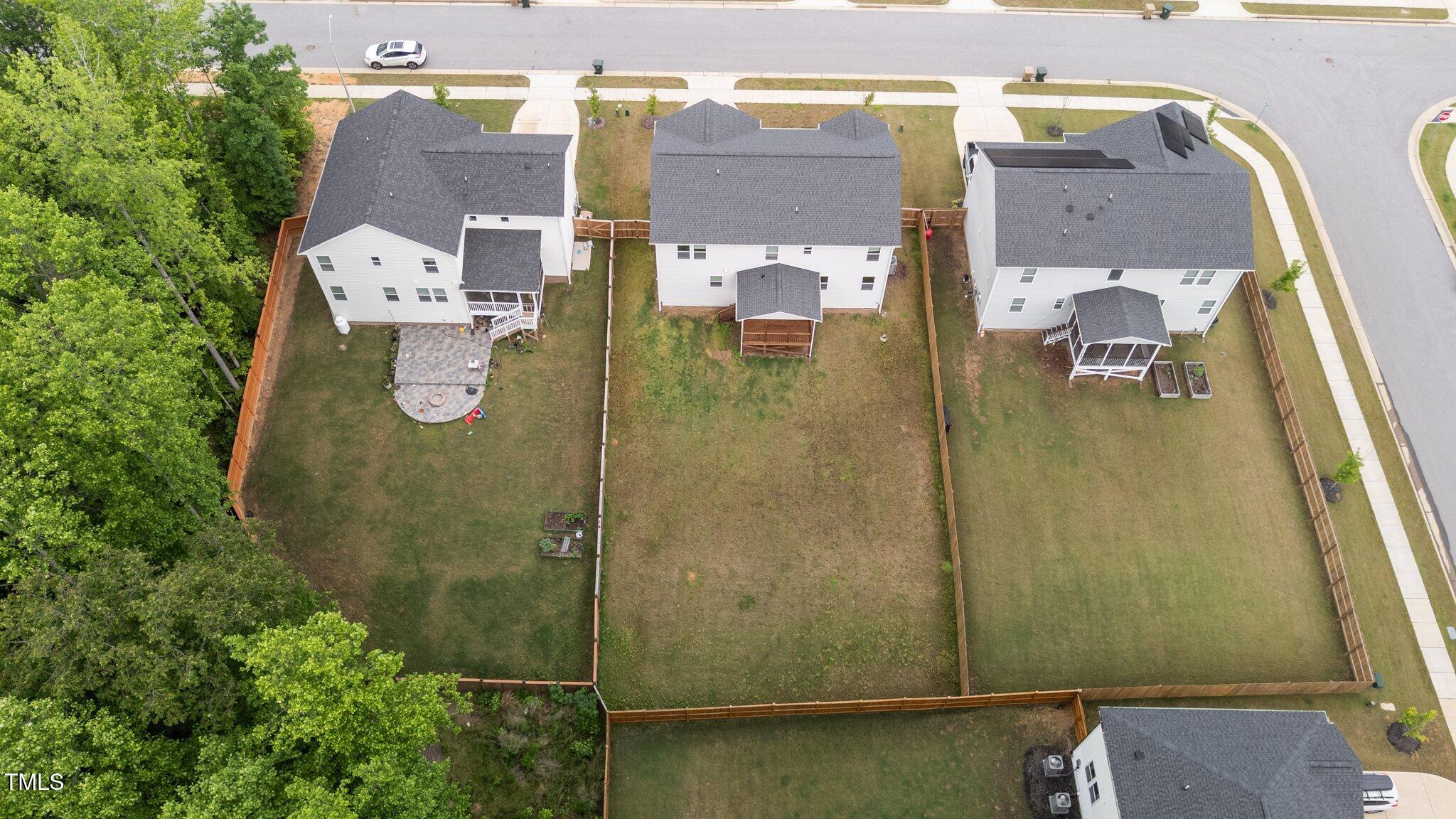 188 Karlov Road Garner, NC 27529 - Photo 38 of 38 an aerial view of residential houses with outdoor space