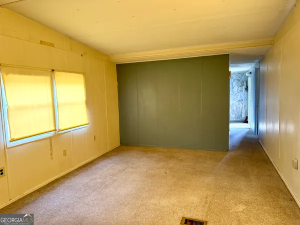 an empty room with window
