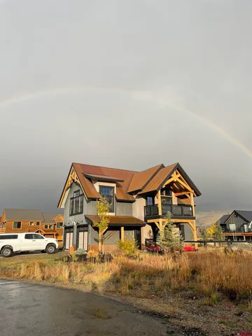 a front view of a house with swimming pool