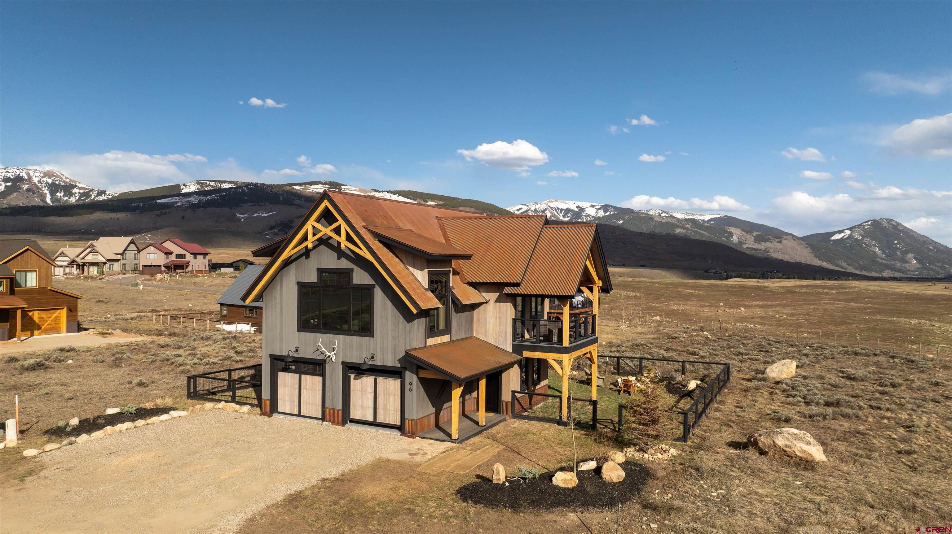 96 Chestnut Lane Crested Butte, CO 81224 - Photo 28 of 37 a view of a terrace with a lake view