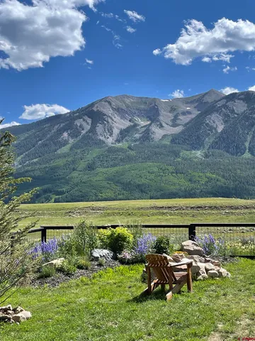 a view of a lake with a mountain in the background