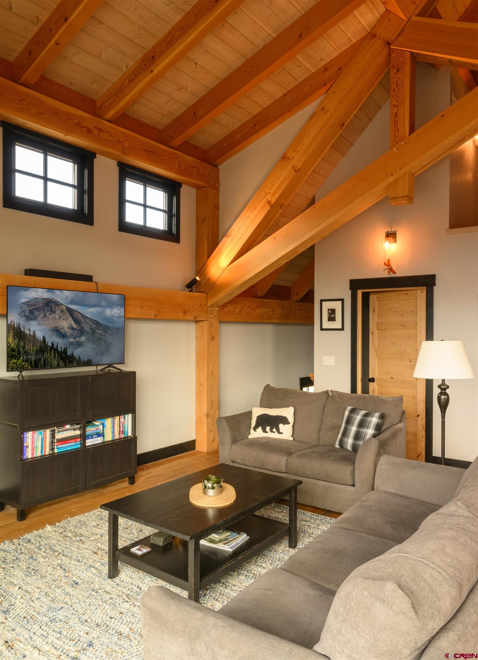 96 Chestnut Lane Crested Butte, CO 81224 - Photo 7 of 37 a living room with furniture and wooden floor