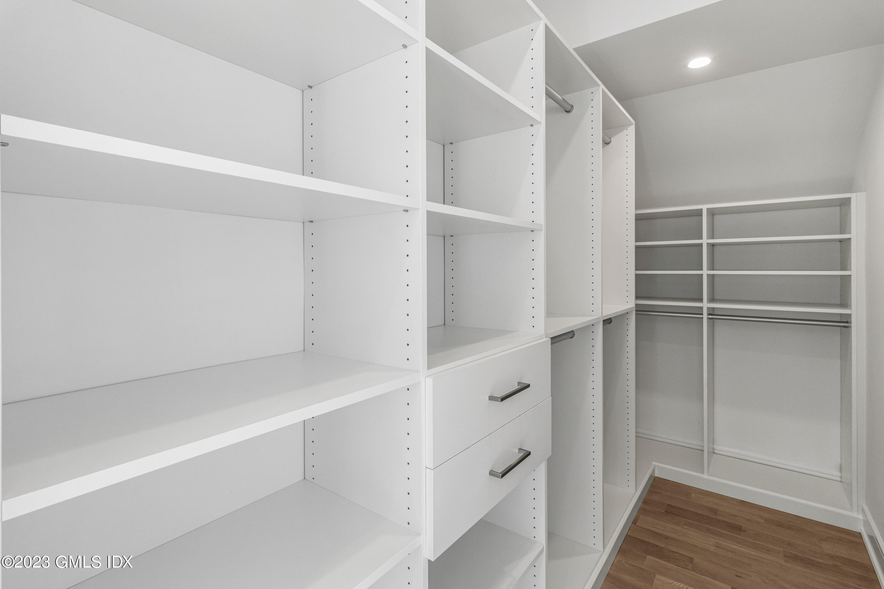 10 Sunshine Avenue Riverside, CT 06878 - Photo 12 of 27 a view of walk in closet with empty racks