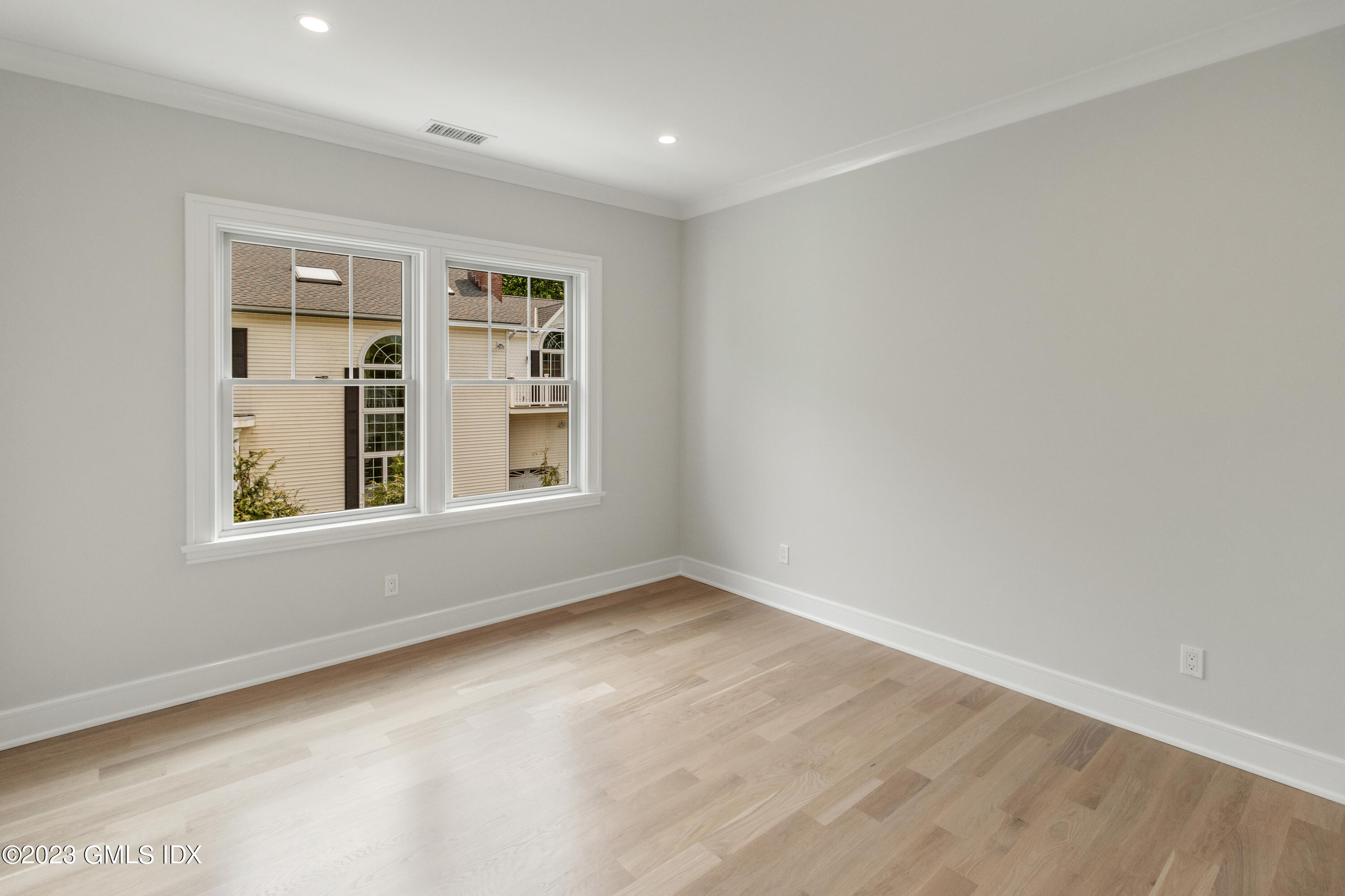 10 Sunshine Avenue Riverside, CT 06878 - Photo 15 of 27 a view of an empty room with a window