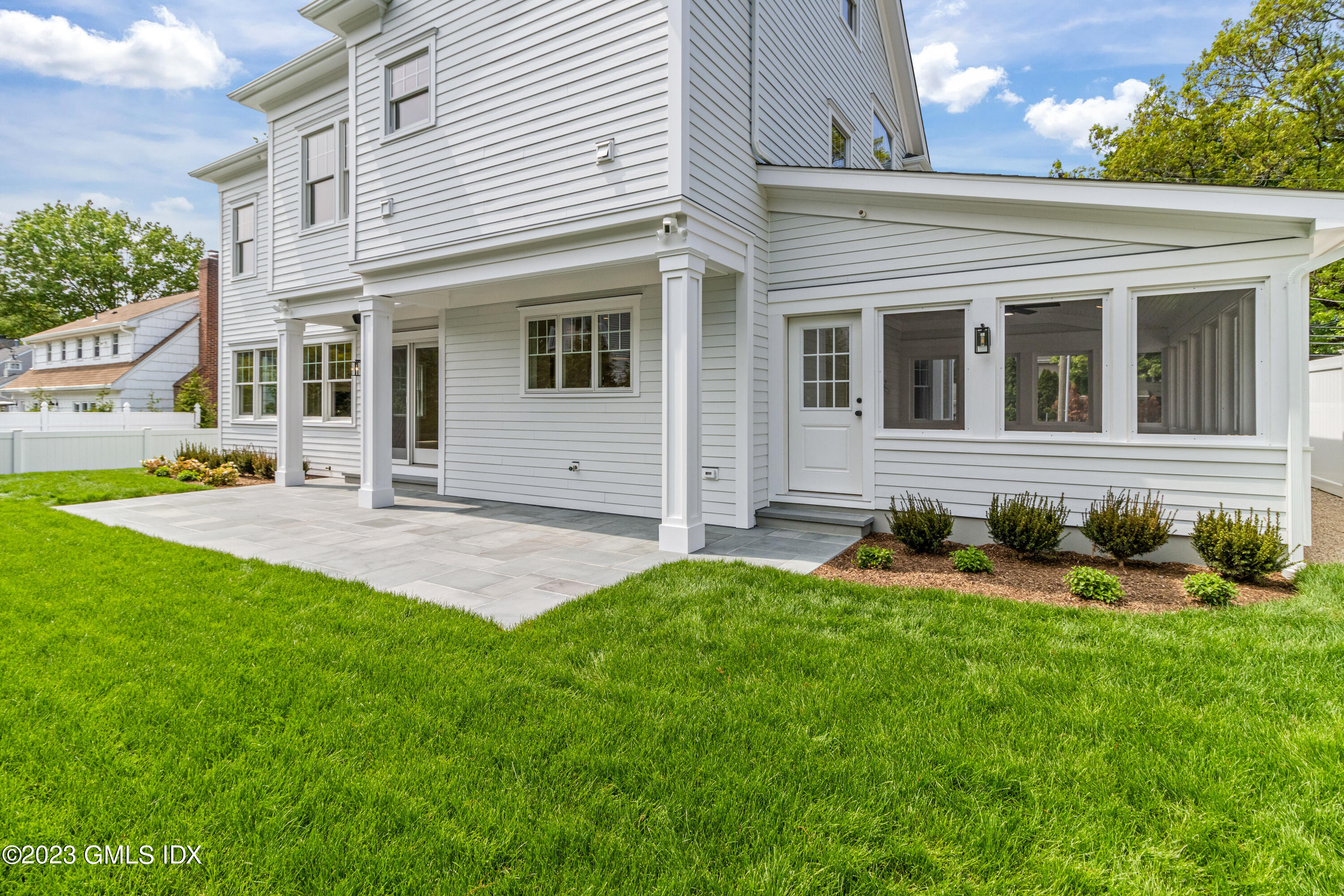 10 Sunshine Avenue Riverside, CT 06878 - Photo 23 of 27 a front view of a house with yard and green space