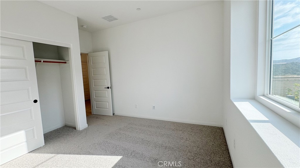 751 Cornelia Way Rancho Mission Viejo, CA 92694 - Photo 13 of 15 an empty room with windows