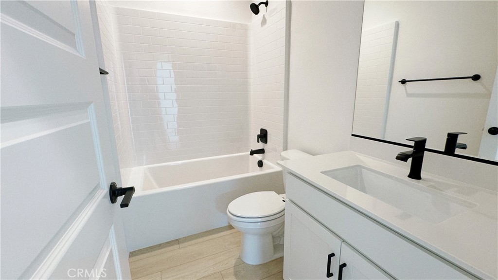 751 Cornelia Way Rancho Mission Viejo, CA 92694 - Photo 14 of 15 a bathroom with a sink a toilet and a tub