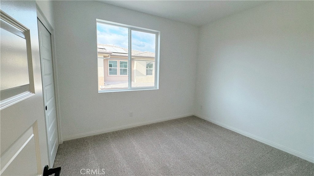 751 Cornelia Way Rancho Mission Viejo, CA 92694 - Photo 15 of 15 an empty room with a window
