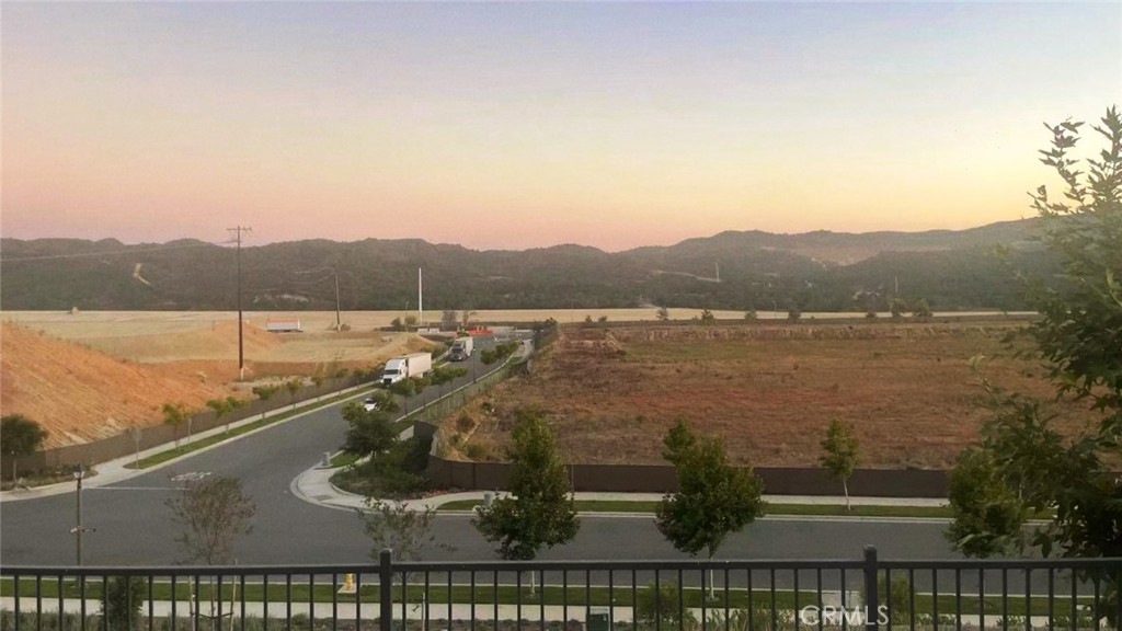 751 Cornelia Way Rancho Mission Viejo, CA 92694 - Photo 10 of 15 a view of a lake with a mountain in the background