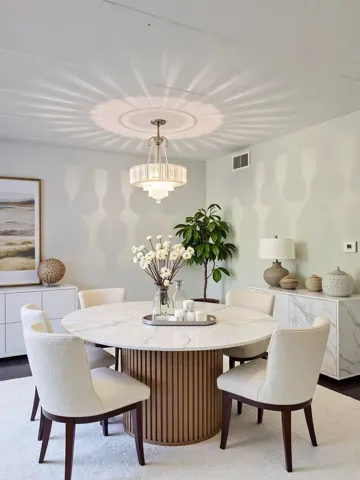 a dining room with furniture a chandelier and wooden floor
