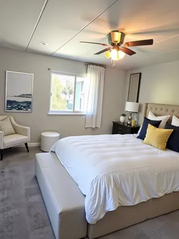 a bedroom with a bed and window