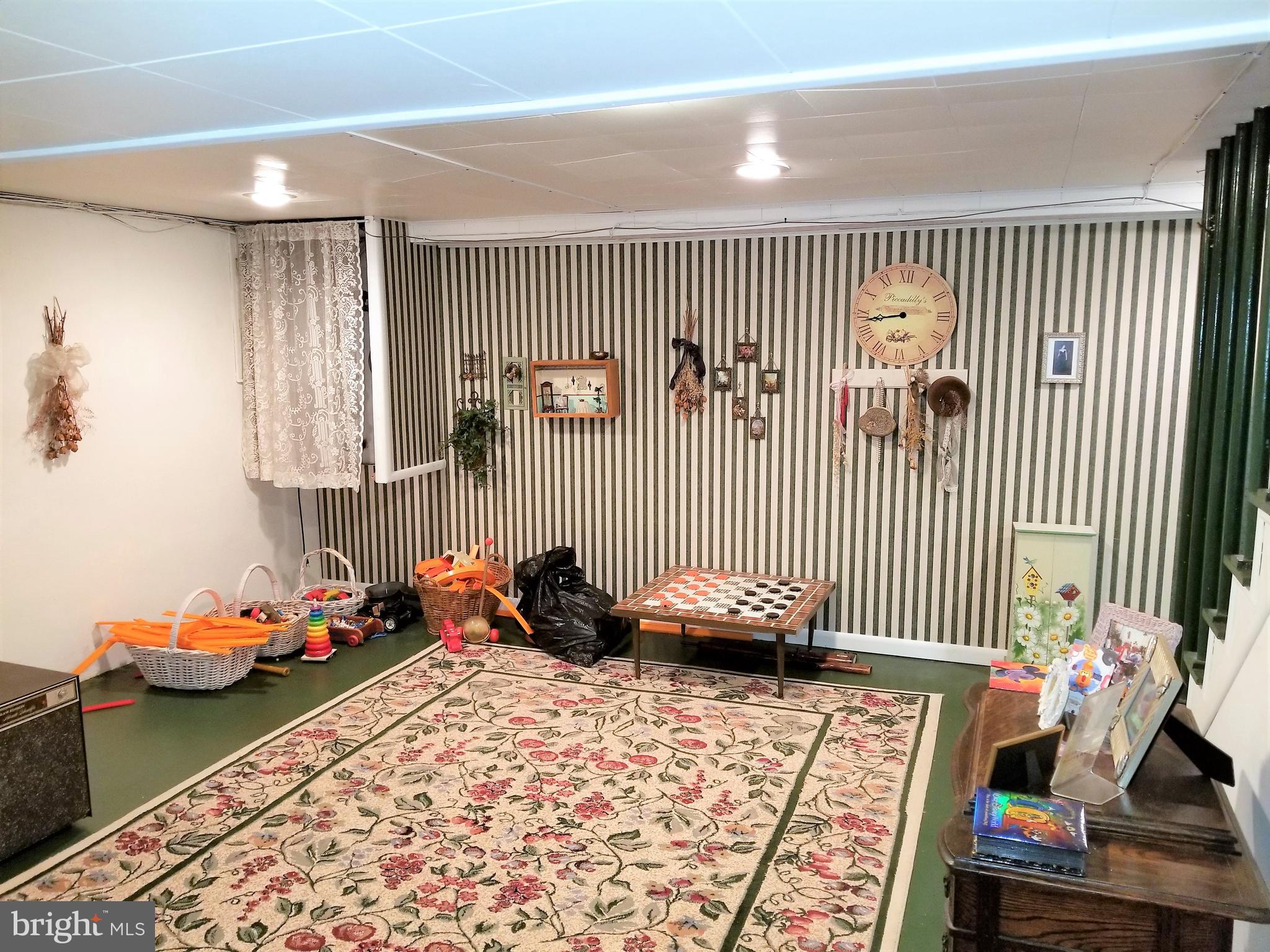 403 Oak Street Riverside, NJ 08075 - Photo 23 of 39 a bedroom with bed and a window